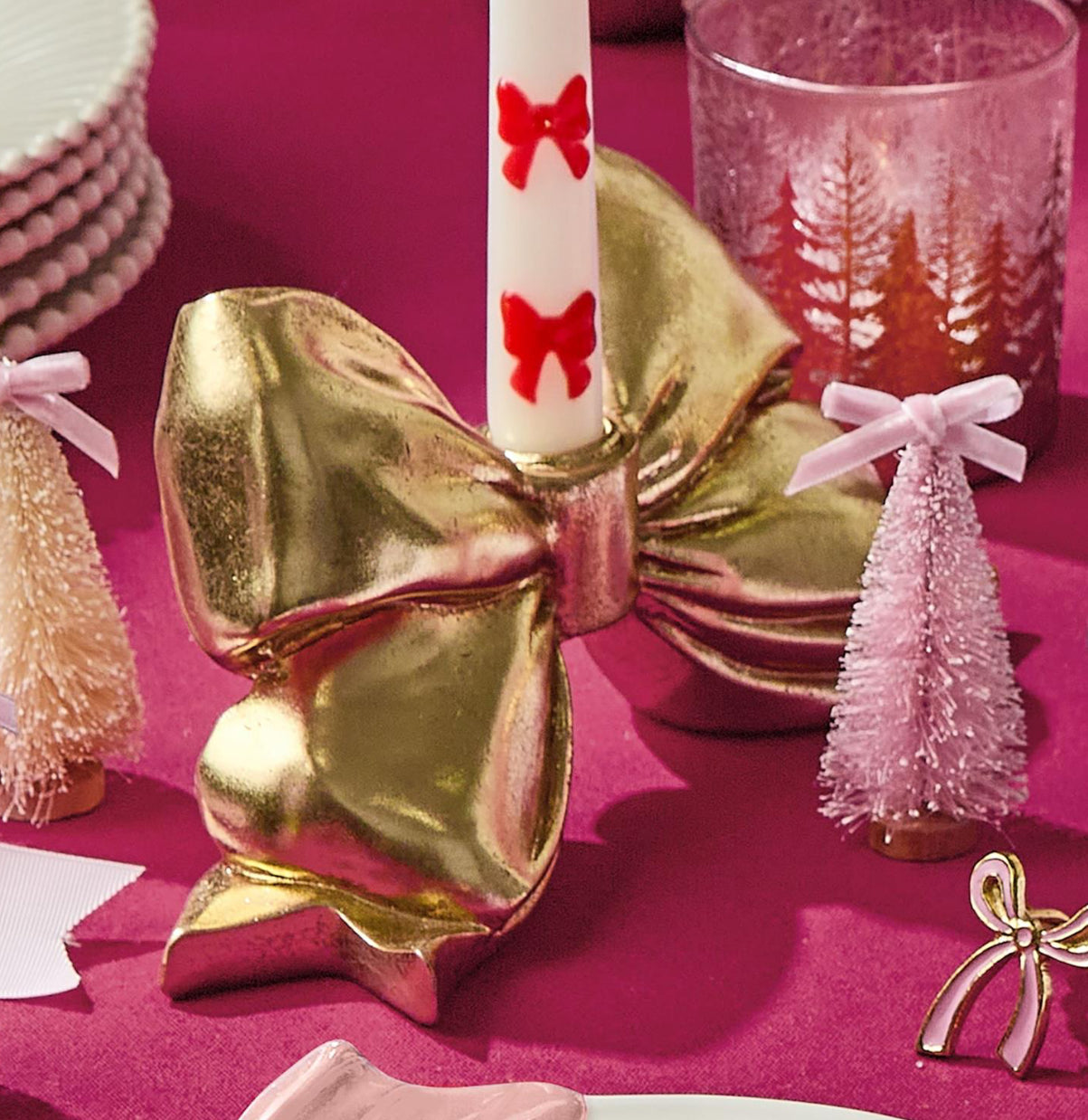 Bow taper candle holder