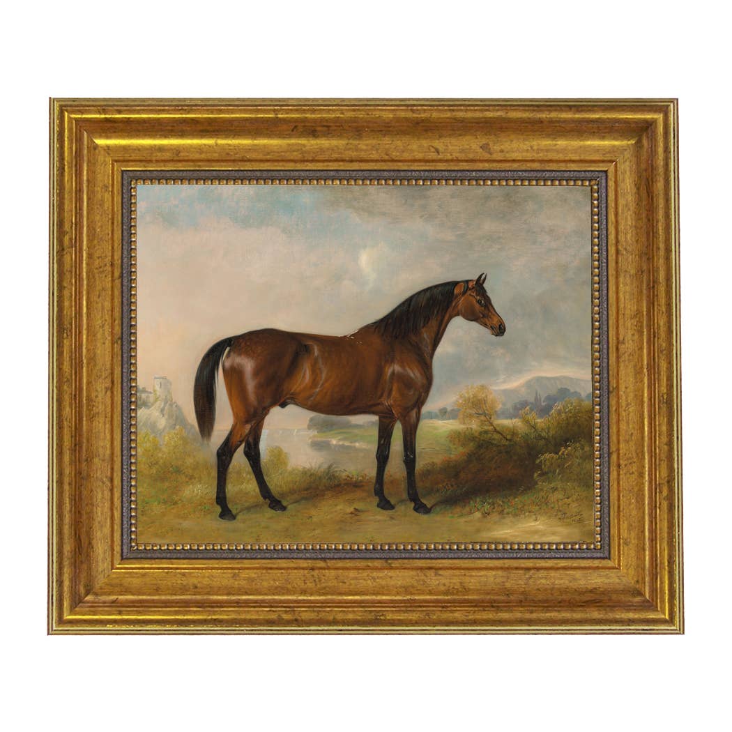 print of horse in gold frame