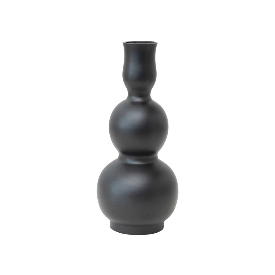 Shapely vase in matte black aluminum.